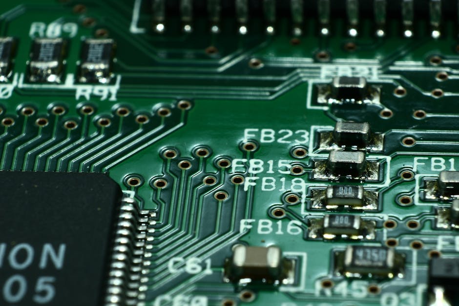 printed-circuit-board-print-plate-via-macro-159220-159220 Detailed macro view of a circuit board showcasing microchips and electronic components.