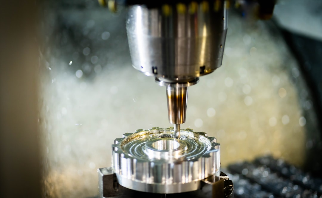 a-machine-that-is-cutting-a-piece-of-metal-8mbtn3z71zi